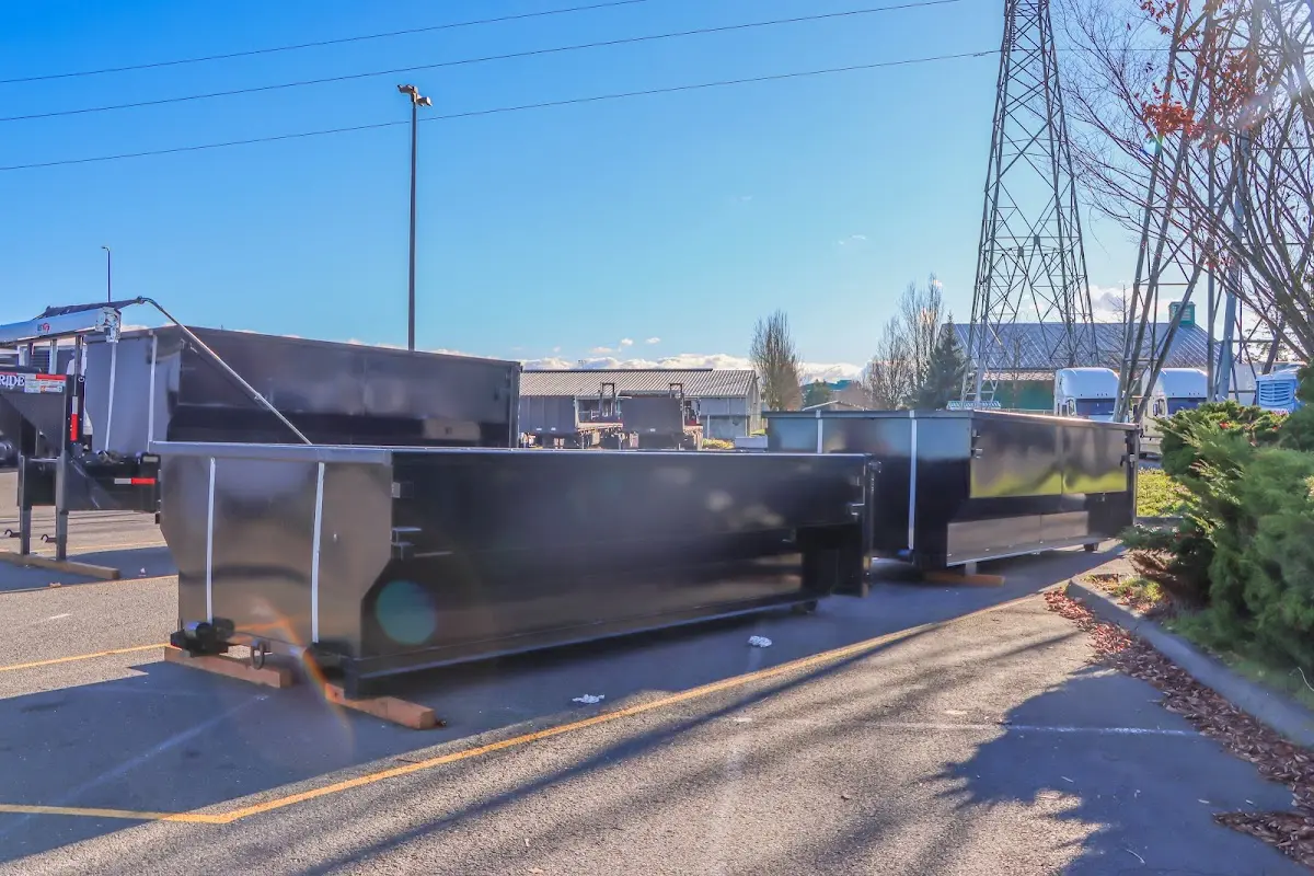 Roll-off dumpster ready for waste disposal at job site for 3 Yard Dumpster Rental in Lilburn